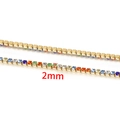Detailed macro view showing a 2mm rainbow rhinestone gold chain with colorful gemstones - Fine Style / Vacuum 18K Gold Multicolor Dense Stone (B9001)