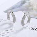 Funkelnde S925 Silber Donut-Ohrringe mit Pavé-Zirkonia und weißen Emaille-Akzenten - Kupfer / Weiß
