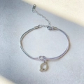 Double-layered stainless steel snake chain bracelet with a letter Q pendant and knot design - Silver-Q