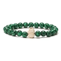 Detailed view of green malachite beads and a white accent stone on an elastic bracelet - Green Malachite