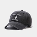 Detail of vintage washed grey cotton baseball cap with Black Lives Matter embroidery - Black Lives Matter Black