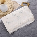 Detail of soft cotton muslin baby blanket with floral print and crochet lace edging - Little Floral