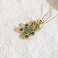 Exquisite gold necklace featuring a green zircon paved teddy bear with heart stones - Gold/Green Zirconia
