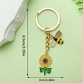Cute bee and sunflower keychain pendant with gold ring on soft green background - Bee Sunflower Style (LS291)