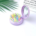 Dettaglio spazzola per capelli viola pieghevole con specchio e setole colorate - Viola