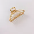 Minimalist gold metal hair claw clip with matte finish and hollow half-circle design - Medium Arc Gold