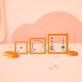 Three sizes of orange PE film floating jewelry boxes for rings, bracelets, and earrings - 7*7*2cm / Orange