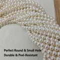 High-quality white round glass pearls with drill holes for DIY jewelry making and crafts - 2mm (Approx 330pcs) / Cream
