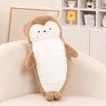 Brown and white seal plush toy made of soft long faux fur on a cozy home sofa - Seal / 70cm