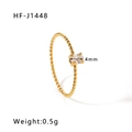 Detail of a 4mm oval white zircon on a gold-plated twisted rope stainless steel ring - US 6 / Gold