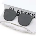 Modern oversized black sunglasses with silver dot accents and a white foldable case - Black One Dot One Bar