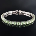Elegant mint green tennis bracelet with silver setting and secure hidden clasp closure - 4mm-16cm / Light Green Zirconia