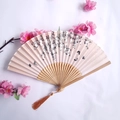 Pink silk folding fan with cherry blossom pattern, carved bamboo ribs and brown tassel - Pink Black Cherry Blossom Butterfly Style (Ladies Fan-14)