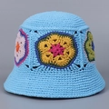 Close-up of hand-crocheted light blue fisherman hat with colorful knitted floral patterns - M (56-58cm) / Sky Blue