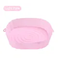 Light pink silicone air fryer liner with wavy edges and spiral textured base - Pink