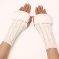 Macro detail of white cable-knit fingerless gloves with soft faux fur cuffs texture - One Size / White