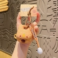 Capybara keychain pendant with brown spiral cord and Chocolate Piglet tag - Khaki Capybara Pear