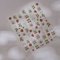 Detailed 3D nail stickers featuring strawberry and silver bow designs on Co-384 sheet - 3D Strawberry Heart Bow Style (CO-384 Silver)