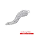 Detailed view of a silver cornicello pendant with pave-set zircons measuring 31x8.5mm - White Gold White CZ VD296