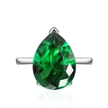 Elegant pear-cut green gemstone ring with silver-tone prong setting on white background - Adjustable Open / Green Zirconia