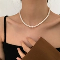 Classic white natural freshwater pearl necklace on model with 14K gold-filled clasp - Large Near-round Pearl