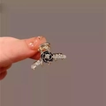 Small black rose hair claw with white rhinestones and golden metal clip for women - Rhinestone Camellia Claw