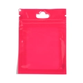 Detailed view of the pink laser pearlescent pouch with ziplock and hanging hole - Red