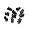 Close-up of black resin gummy bear charms with silver metal loops for DIY jewelry - Black