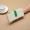Long white pebbled leather wallet for women with green strap accent and golden zipper - White