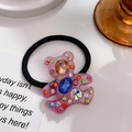 Purple resin bear hair tie featuring colorful rhinestones and black elastic band - Metallic Pink