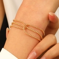 Dreilagiges goldenes Erbsketten-Armbandset mit ineinandergreifenden runden Gliedern - Gold Dreilagige Feine Rollo-Kette (1846)