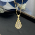 Close-up of a gold-plated teardrop pendant necklace encrusted with white zircon stones - Gold (8307)