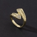 Macro shot of gold-plated open ring with heart-shaped white zircon paving and sleek finish - Style 7