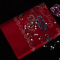 Red cashmere-like shawl with intricate gold and blue floral embroidery and tassel fringe - Burgundy