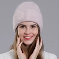 Chic light pink rabbit fur blend knit beanie for women featuring a ribbed texture design - Lotus Pink