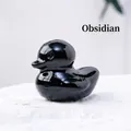 Hand-carved obsidian duck figurine with a polished black gemstone finish for home decor - Obsidian