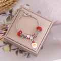 Detailed shot of Christmas themed snake chain bracelet with festive charms on a gift box - Santa Gift Box Style(7#)