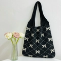 Knitted tote bag with black and white checkerboard bow patterns and soft handles - Black and Apricot