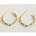 Golden C-shaped heart hoop earrings with colorful zircon stones on textured metal surface - Colorful Square Zirconia Style (ES2282) / Gold