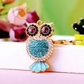 Golden owl keychain with purple and blue crystals and blue enamel finish - A430 Owl B Blue