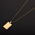 Golden titanium steel necklace featuring rectangular pendant engraved with BREATHE - BREATHE