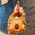 Brown knitted bear mini pouch keychain for coins and AirPods held by hand - Capybara Head