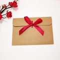 Vintage brown kraft paper envelope with red ribbon bow and plum blossom decoration - Envelope with Wine Red Ribbon