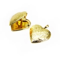 Detail of open and closed heart locket pendants with floral engraving in gold finish - Ornate Swirl