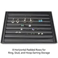 Black 8-row PU leather jewelry tray displaying various rings and stud earrings - 8 Rows Ring Tray