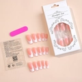 Detail of 24pcs long white French tip press-on nails with adhesive tabs and nail file kit - White French Style (XD-50-36)