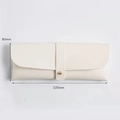 Cream leather sunglasses pouch with metal stud closure, measuring 225mm by 90mm - White Glasses Case