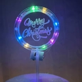Detail of a glowing Merry Christmas cake topper with colorful LED lights on acrylic - Style 7 Multi-color Light