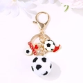 Golden soccer keychain featuring 3D football, red cleat, and SOCCER charm tag - Gold Multi-Pendant Soccer Red Shoe Style