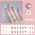 Detail of lavender and white press-on nails with 3D bows, pearls and cloud designs - BD046 Purple White Bow Cloud Style